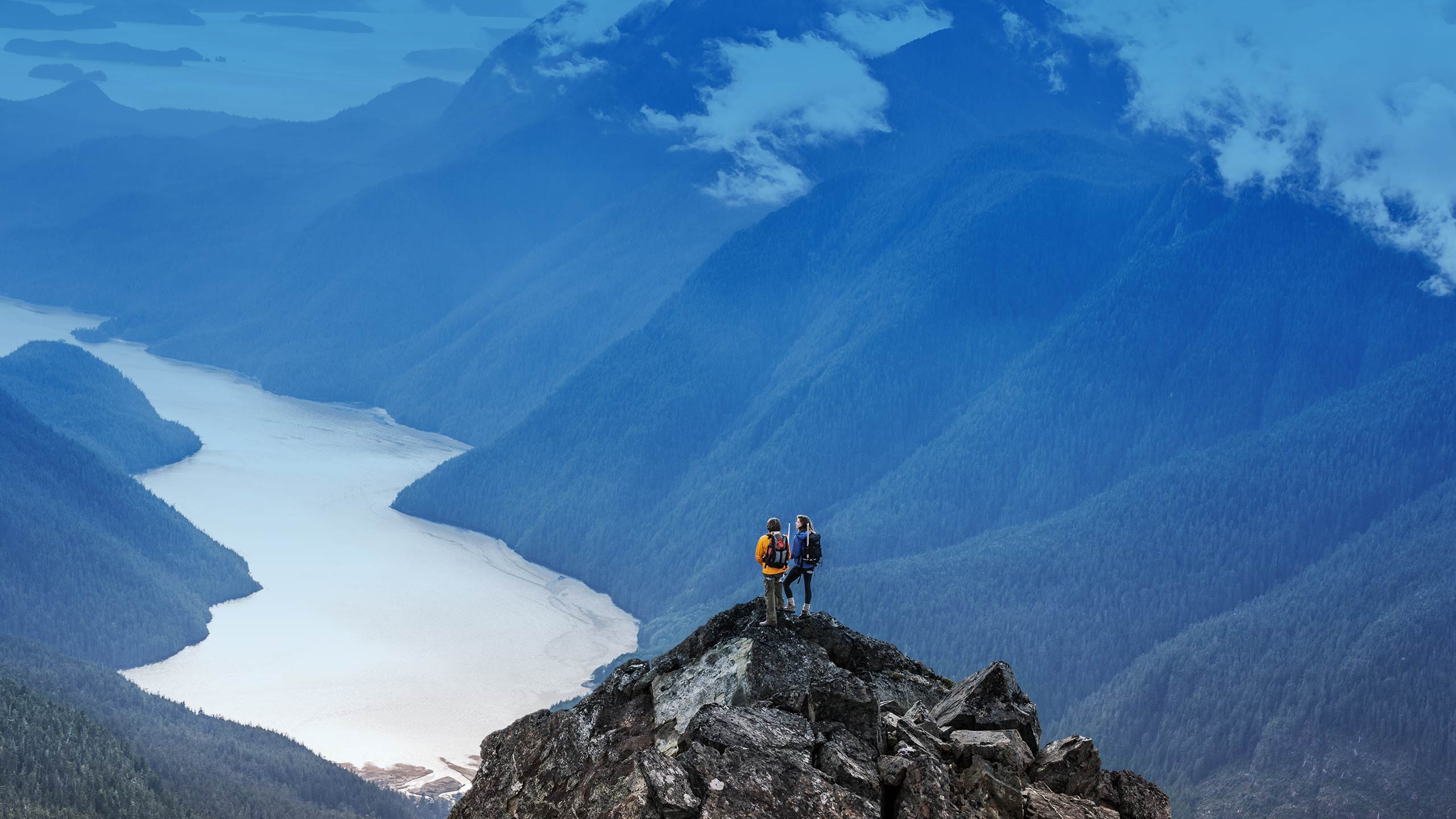 Cisco brand photograph of hikers on mountain summit